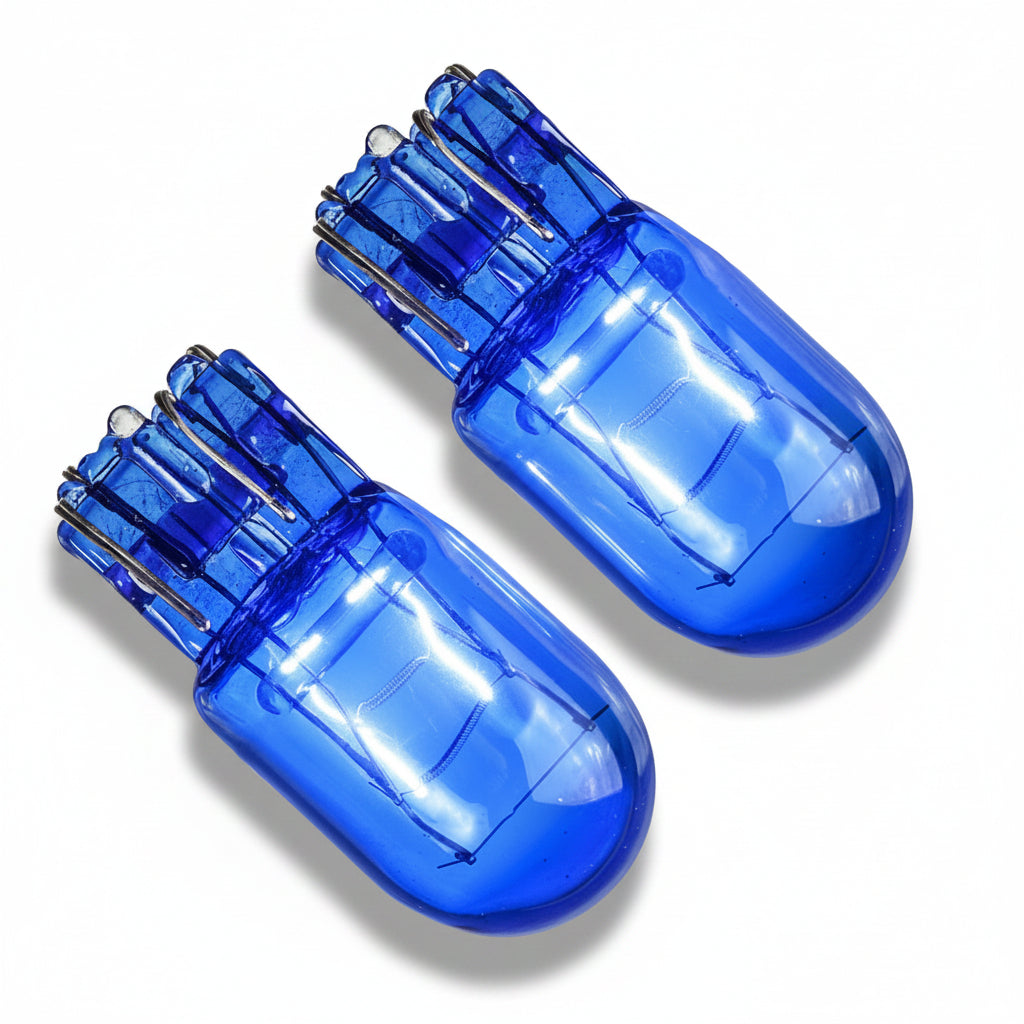 Two blue light bulbs on a white background
