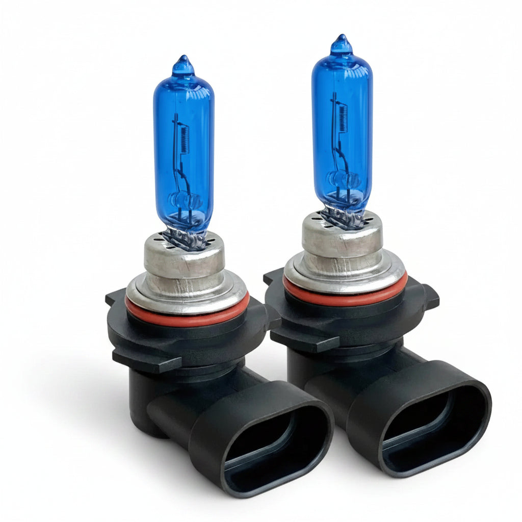 Two blue car headlight bulbs with black housing on a white background