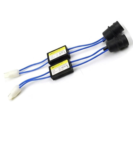 Two black rectangular electronic modules with blue wires, white connector ends on one side and black connector ends on the other, shown on a white background.