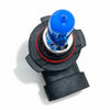 Car headlight bulb with blue glass on a white background