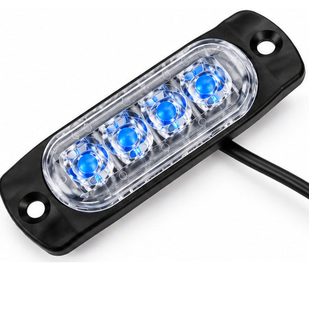 A rectangular black LED light bar with four bright blue illuminated LEDs under a clear protective cover, shown on a white background with a black wire extending from the right side.