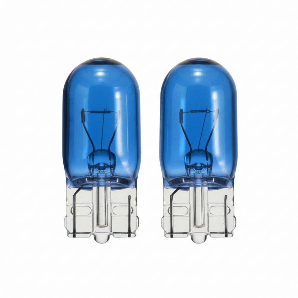 Two blue car light bulbs on a white background